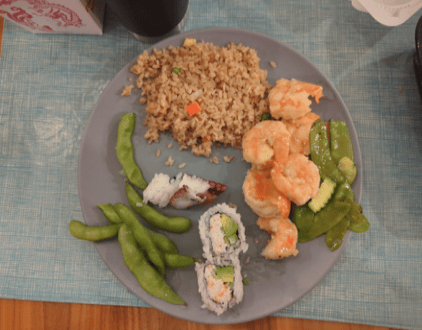 Client X's later food-journal photo of rice, seafood and vegetables